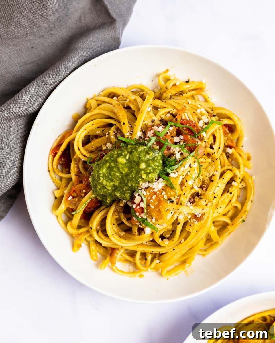 Cherry Tomato and Pesto Pasta Recipe for Quick Weeknight Meals 7 a top down view of a bowl of cherry tomato pesto pasta