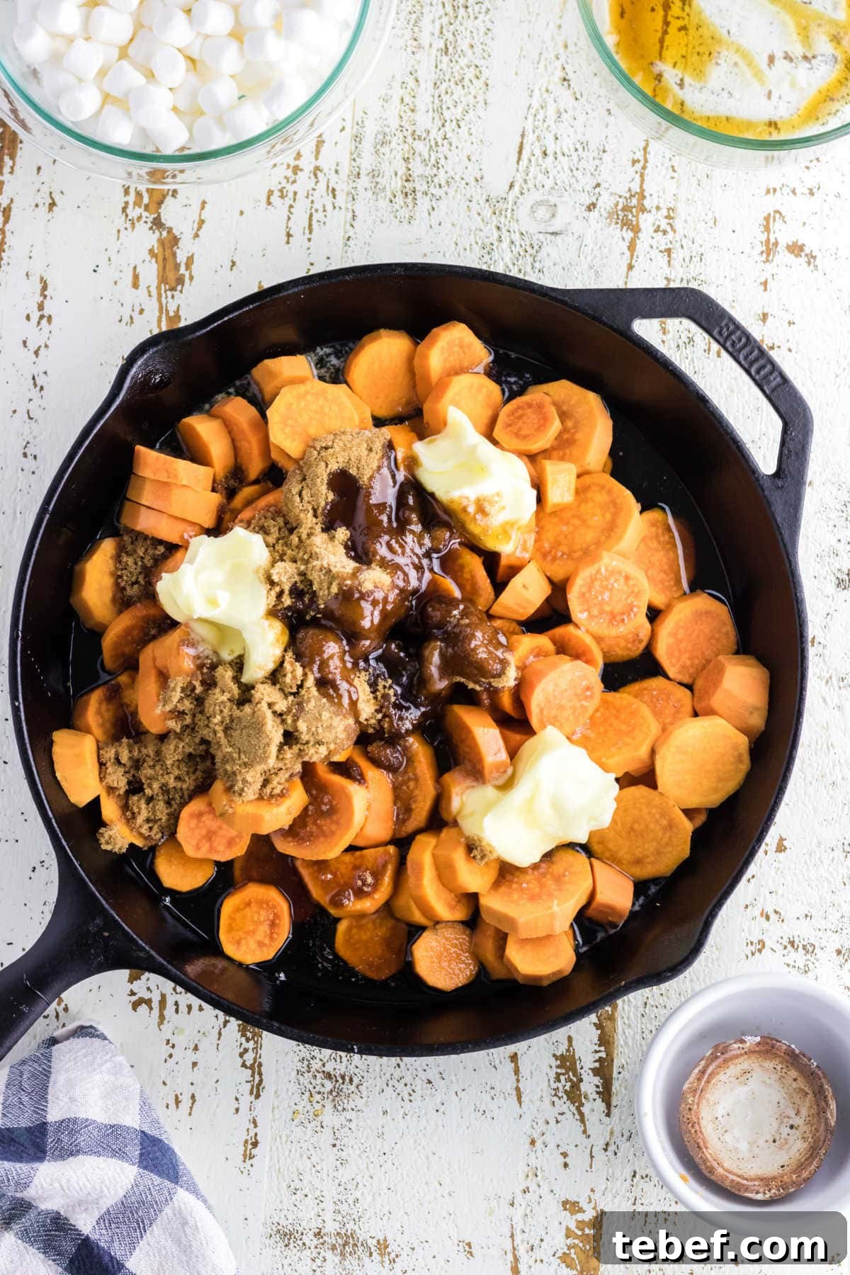 Southern Candied Yams Recipe with Brown Sugar and Pecans 5 Drained sweet potatoes in a skillet with butter and remaining ingredients.