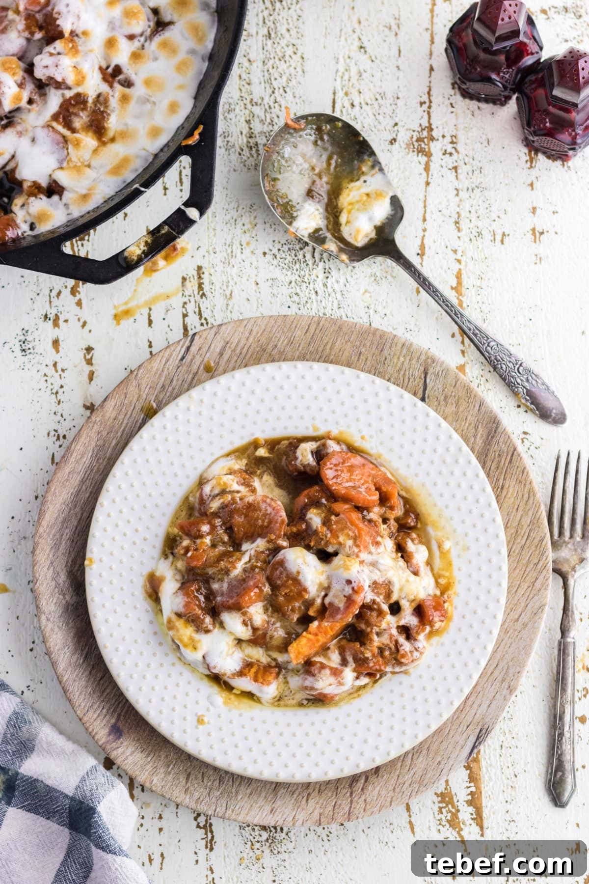 Southern Candied Yams Recipe with Brown Sugar and Pecans 9 A plateful of yams on a table.