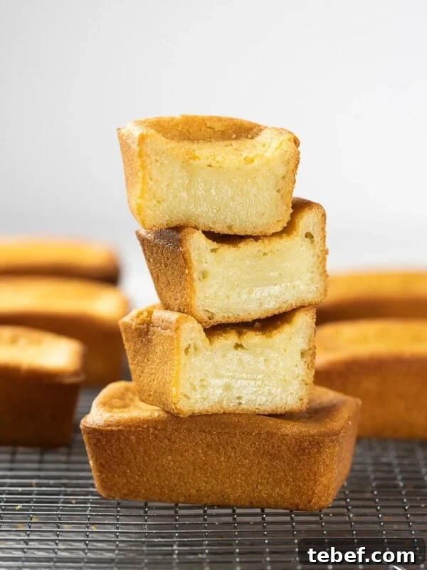 Authentic Japanese Strawberry Shortcake Recipe — Light, Fluffy Layers 13 butter mochi stacked on top of a wire rack
