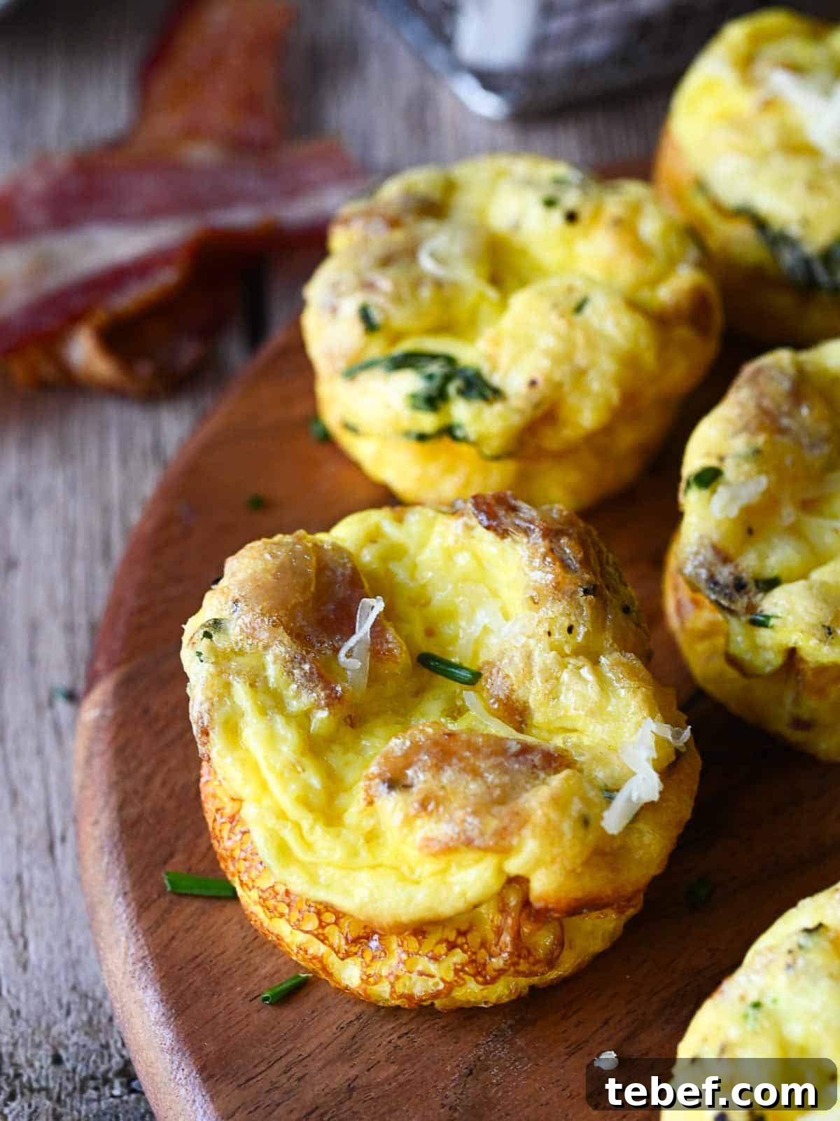 Buttermilk Bacon and Egg Bites Recipe for Brunch or Meal Prep 2 Close-up on a buttermilk bacon egg bite.