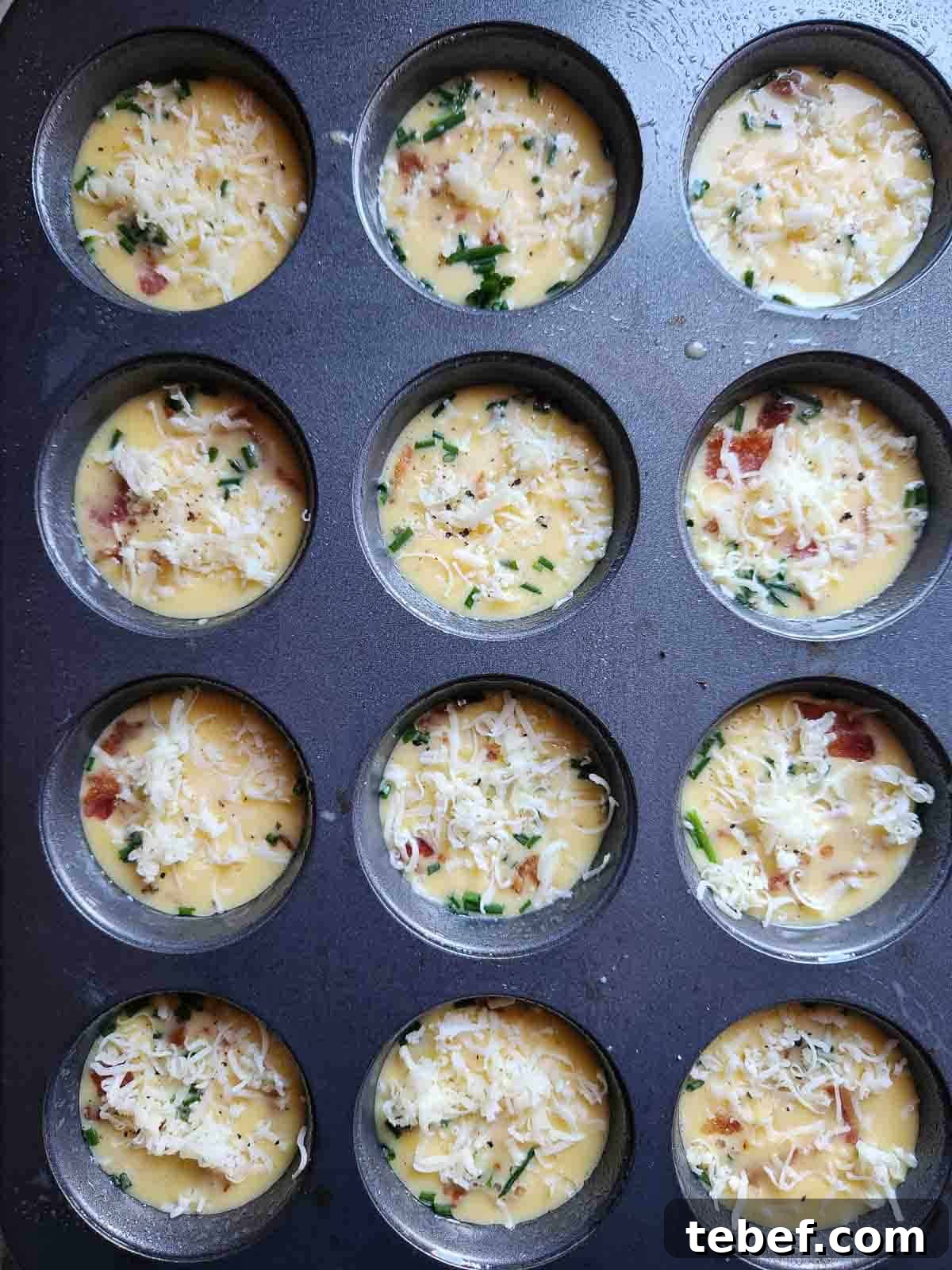 Buttermilk Bacon and Egg Bites Recipe for Brunch or Meal Prep 7 Egg bite batter in a muffin tin.