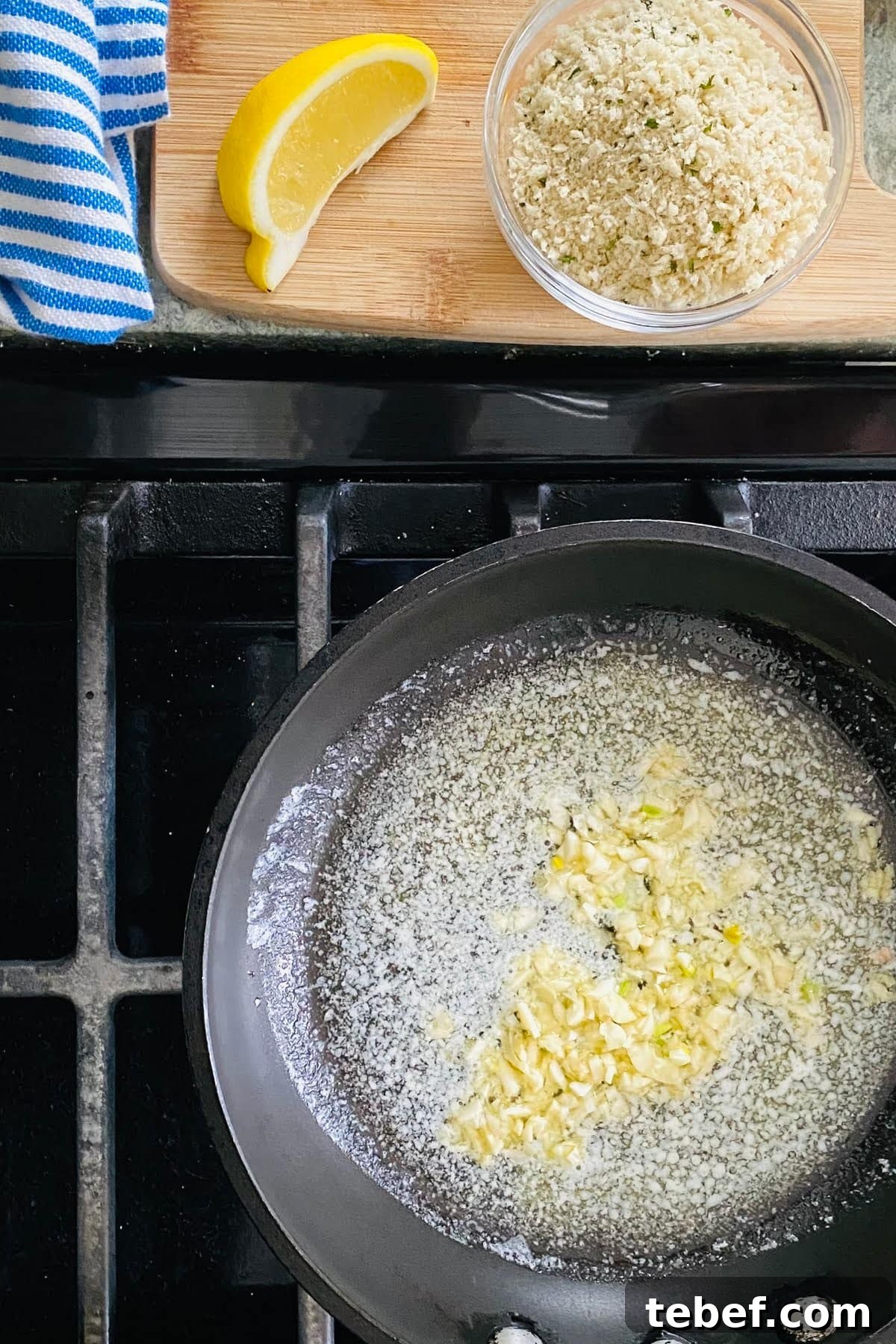 Sauteing garlic in butter.