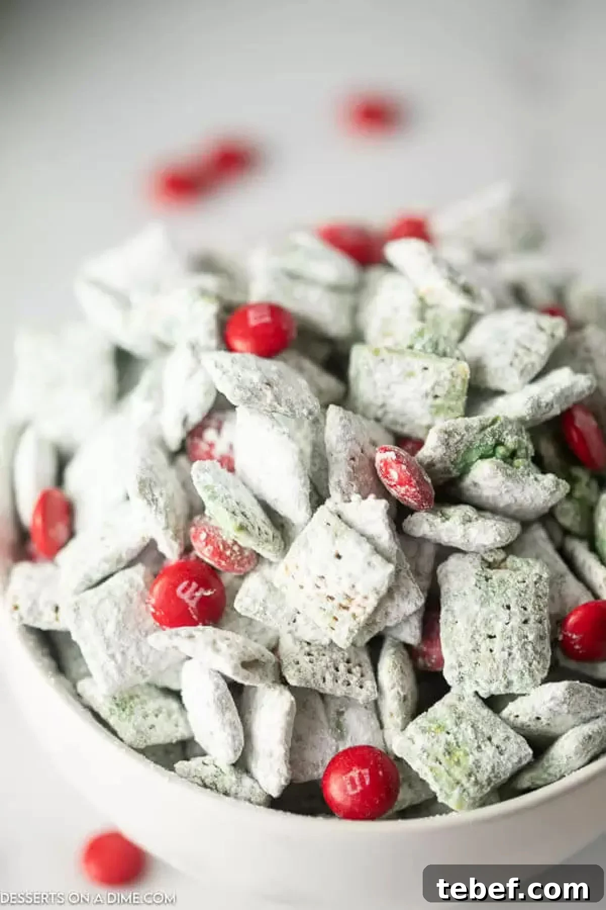 Grinch Puppy Chow Holiday Snack Mix Recipe 2 Grinch puppy chow in a bowl