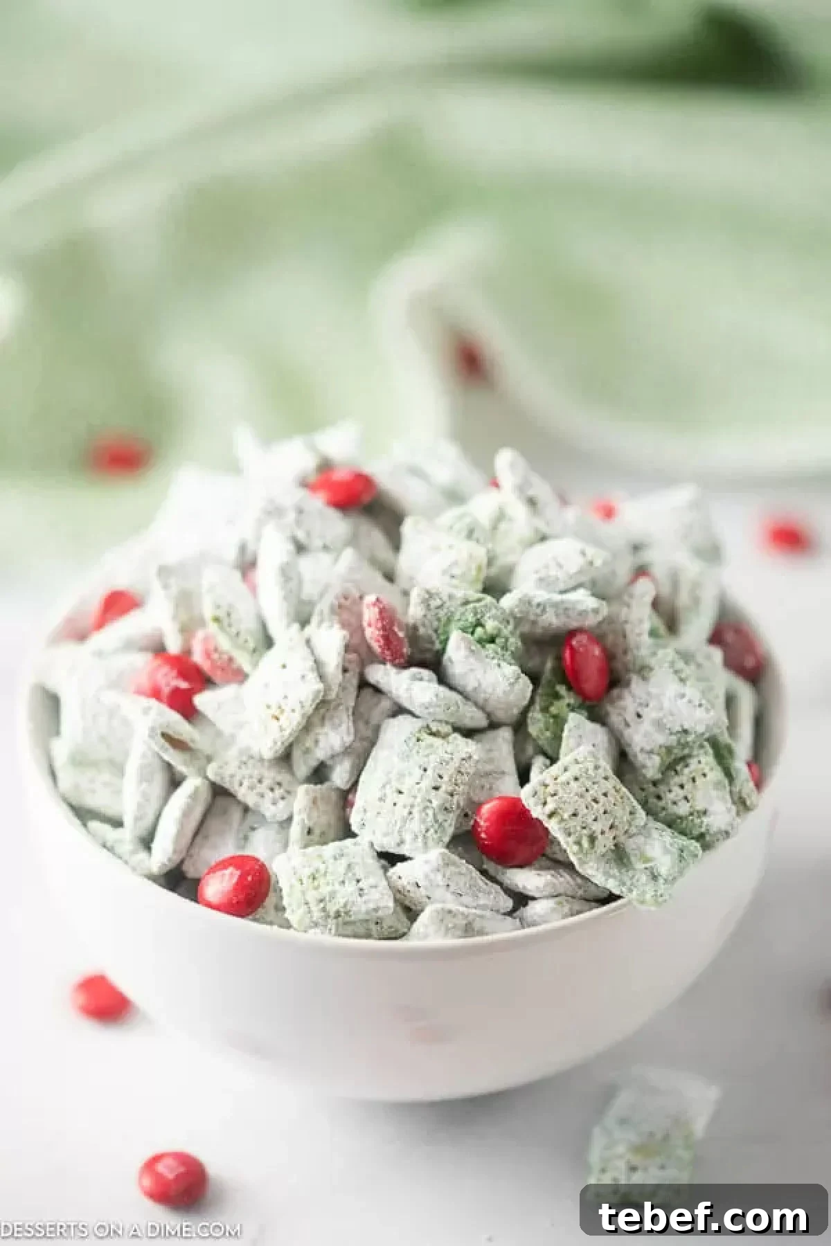 Grinch Puppy Chow Holiday Snack Mix Recipe 3 Grinch puppy chow in a bowl