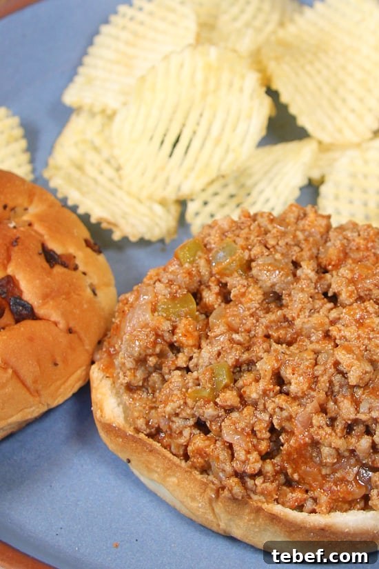 Ground turkey in a tomato sauce served on a hamburger bun.