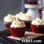 Eggless Red Velvet Cupcakes Without Buttermilk — Moist Recipe 10 cropped image of red velvet cupcakes placed on a card to fit the recipe card size