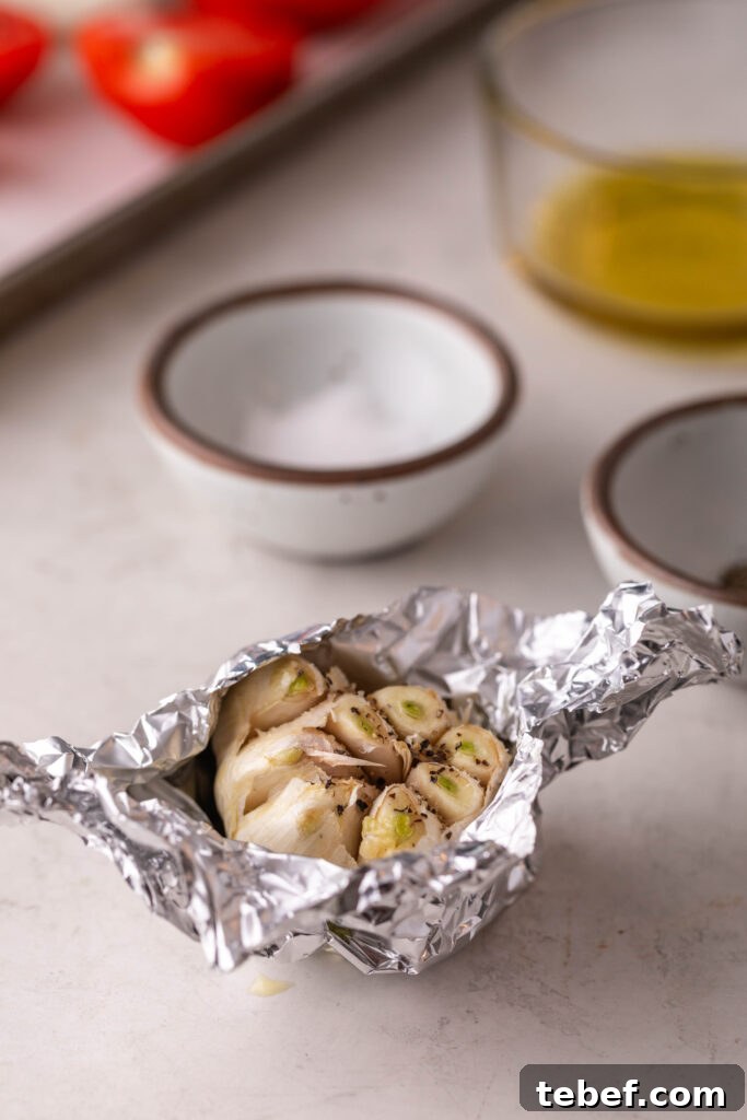 Creamy Sheet-Pan Roasted Tomato Soup Recipe 6 garlic bulb wrapped in foil and seasoned with salt and pepper