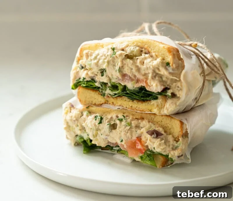 Quick Tuna Salad Recipe with Simple Ingredients 3 best tuna salad sandwich with with pickles on a plate