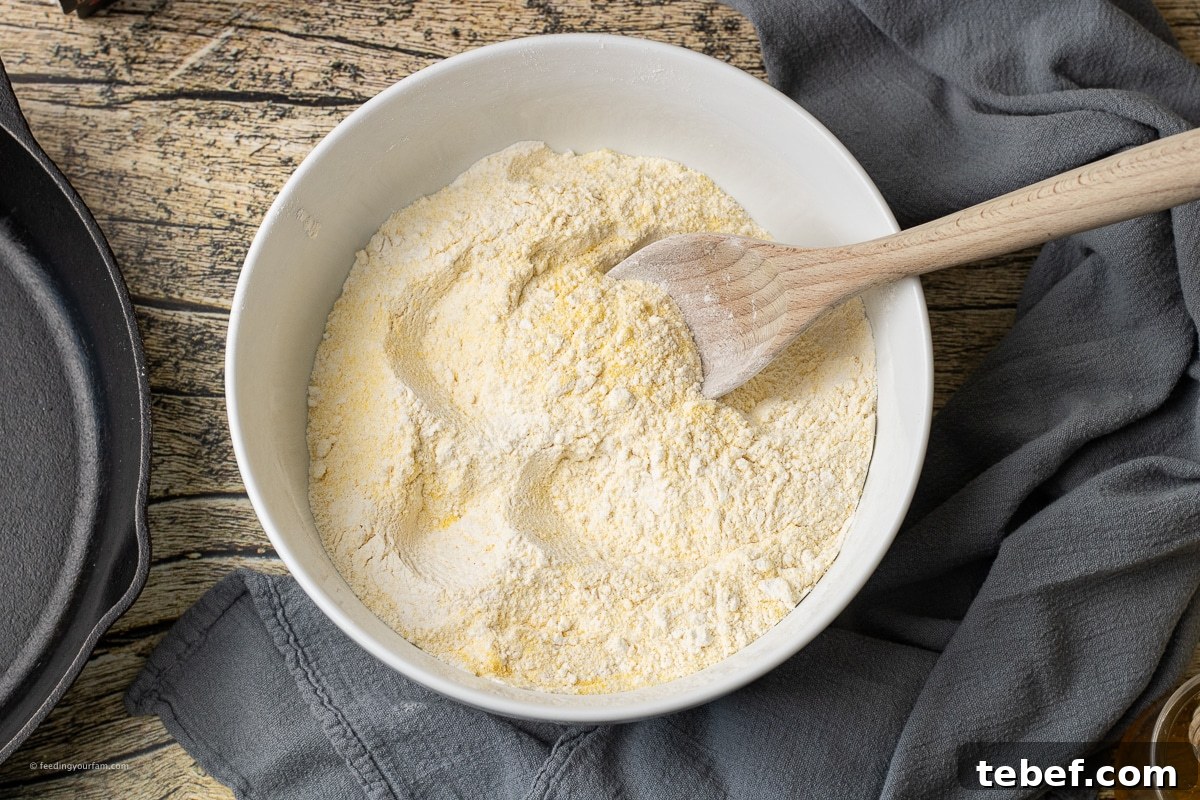 Skillet Cornmeal Biscuits: Crispy Golden Biscuits from Cast Iron 5 flour, cornmeal, baking powder and salt combined