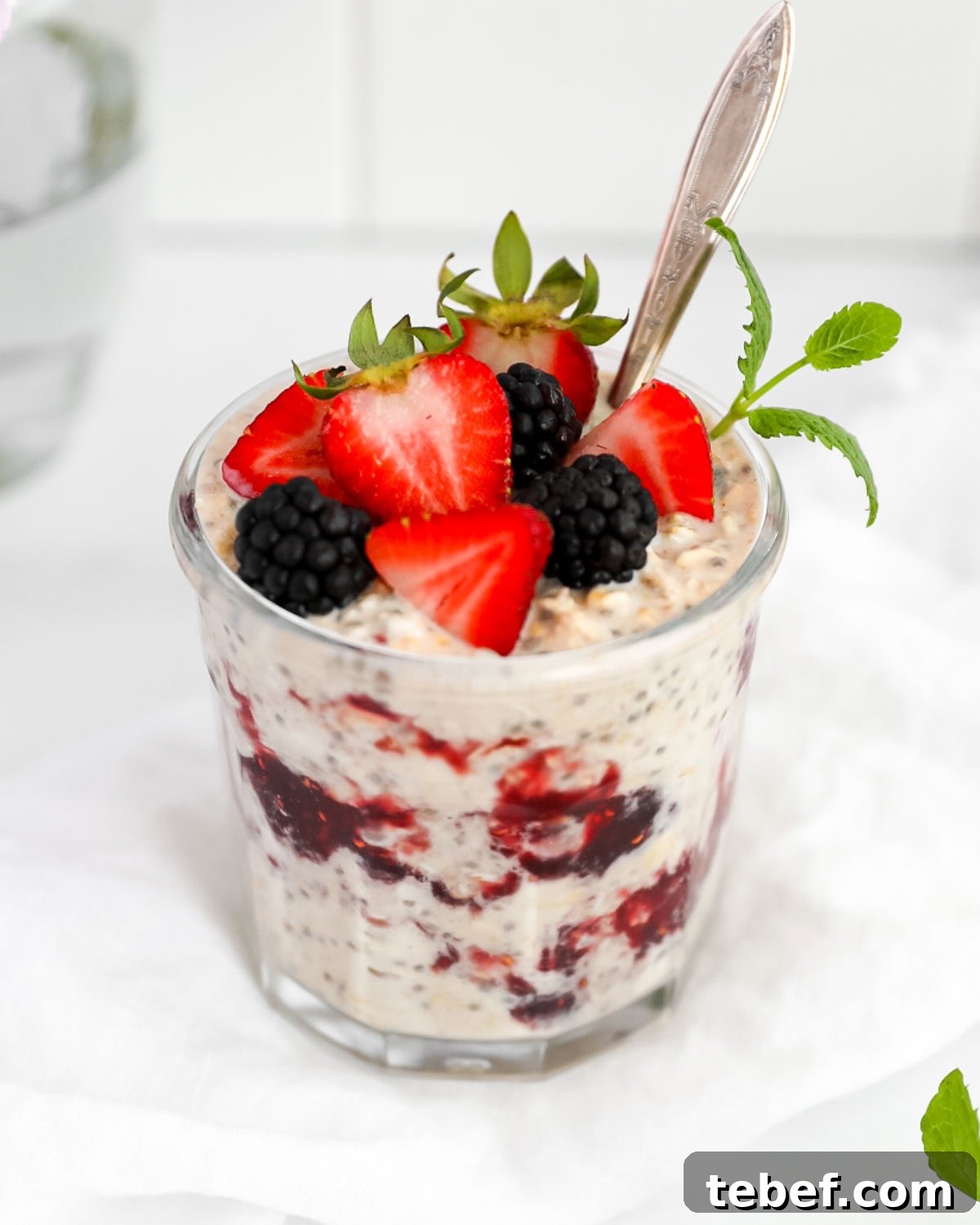 Peanut Butter and Jelly Overnight Oats Recipe for a Quick Breakfast 5 Overnight oats in a glass jar.