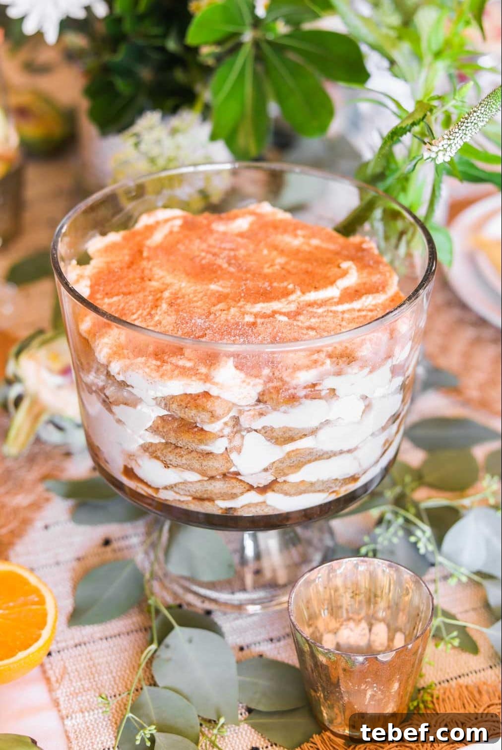 Stress-Free Thanksgiving Hosting: Planning Tips for a Smooth Holiday 6 Tiramisu in a glass trifle bowl with green and white flowers