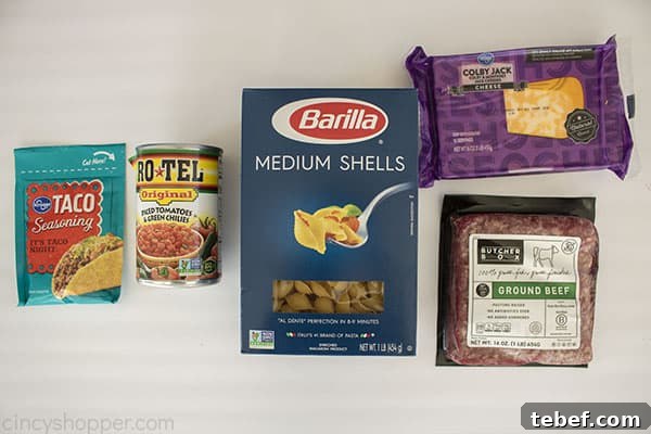 Cheesy Taco Pasta Bake with Ground Beef and Salsa Verde 7 Ingredients to make Taco Pasta