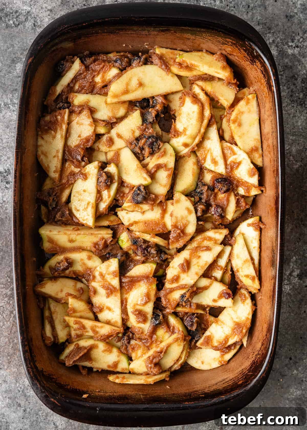 Mom’s Overnight French Toast Casserole Recipe for Busy Mornings 6 overhead: French toast casserole recipe assembled in a baking dish before adding bread