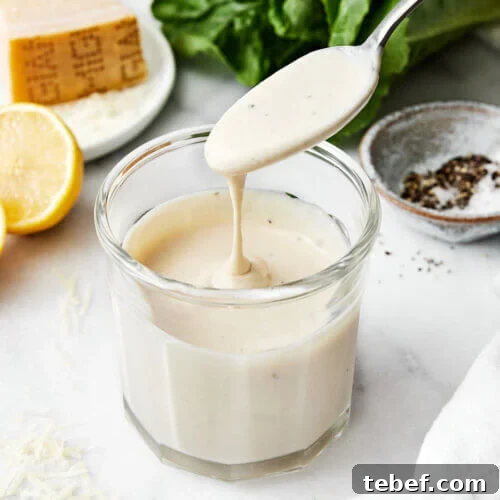 14 Flavorful Salad Dressings and Vinaigrettes for Fresh Salads 10 A cup of Caesar dressing.