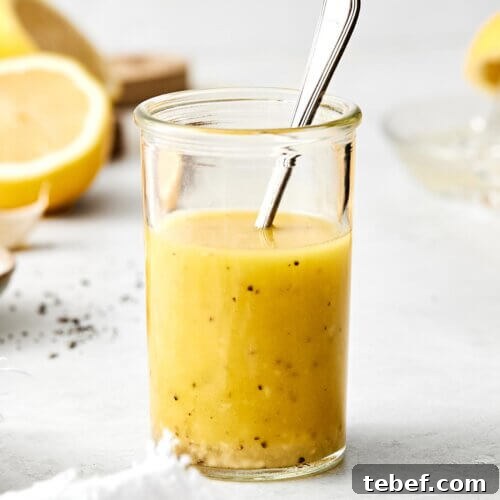 14 Flavorful Salad Dressings and Vinaigrettes for Fresh Salads 2 A glass jar of lemon vinaigrette dressing.