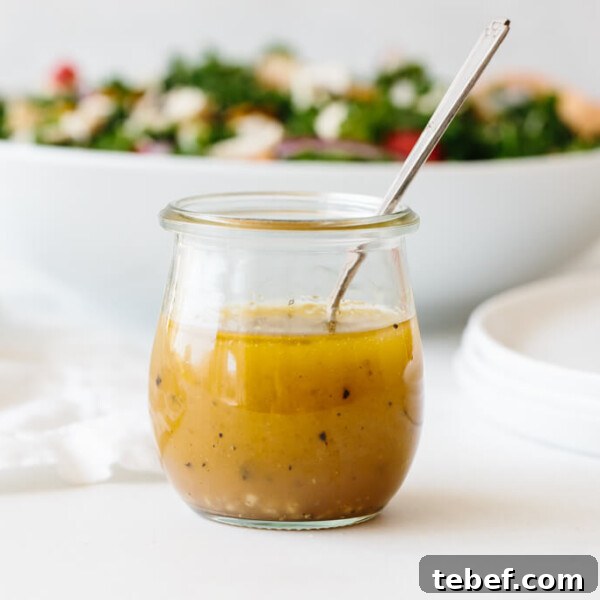 14 Flavorful Salad Dressings and Vinaigrettes for Fresh Salads 6 Apple cider vinegar dressing in a glass jar.
