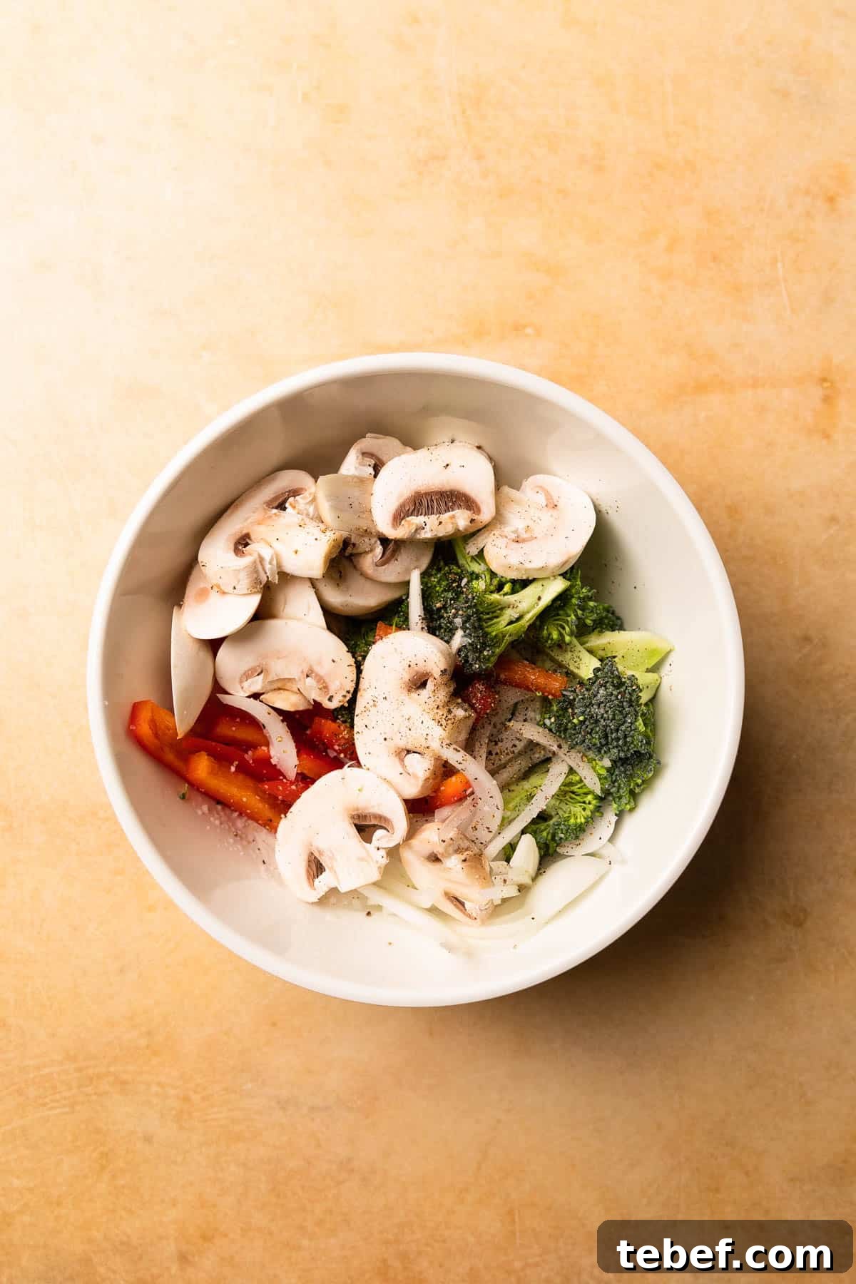 cut up vegetables in a bowl
