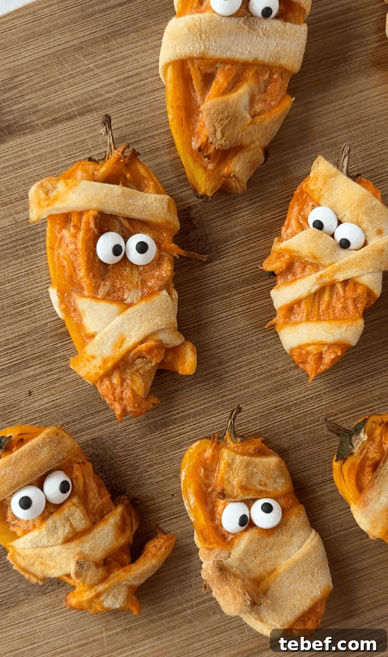 Vertical image of 5 mini bell pepper mummies