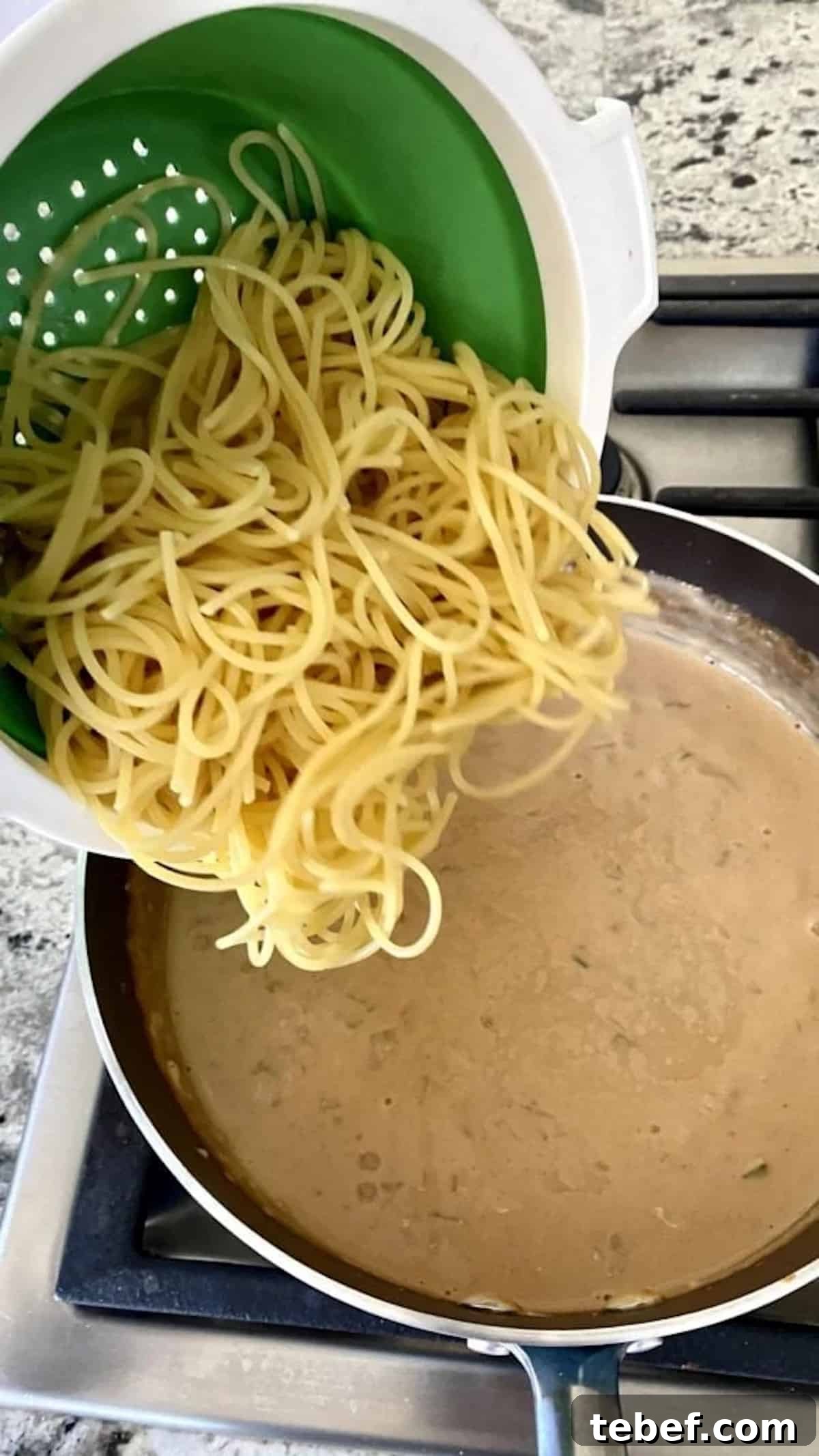 I am adding whole-grain spaghetti to the creamy mushroom sauce.