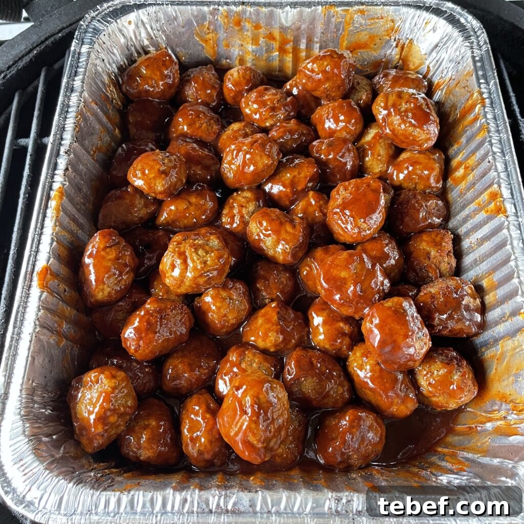Grilled meatballs glazed in BBQ sauce
