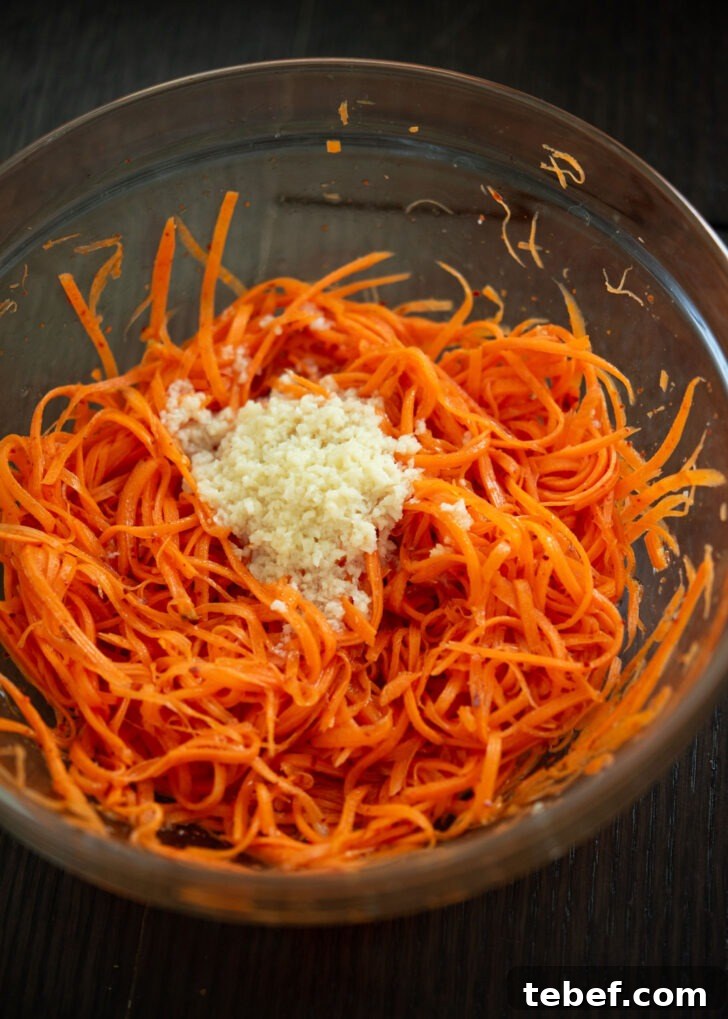 Oiled garlic added to carrot mixture.