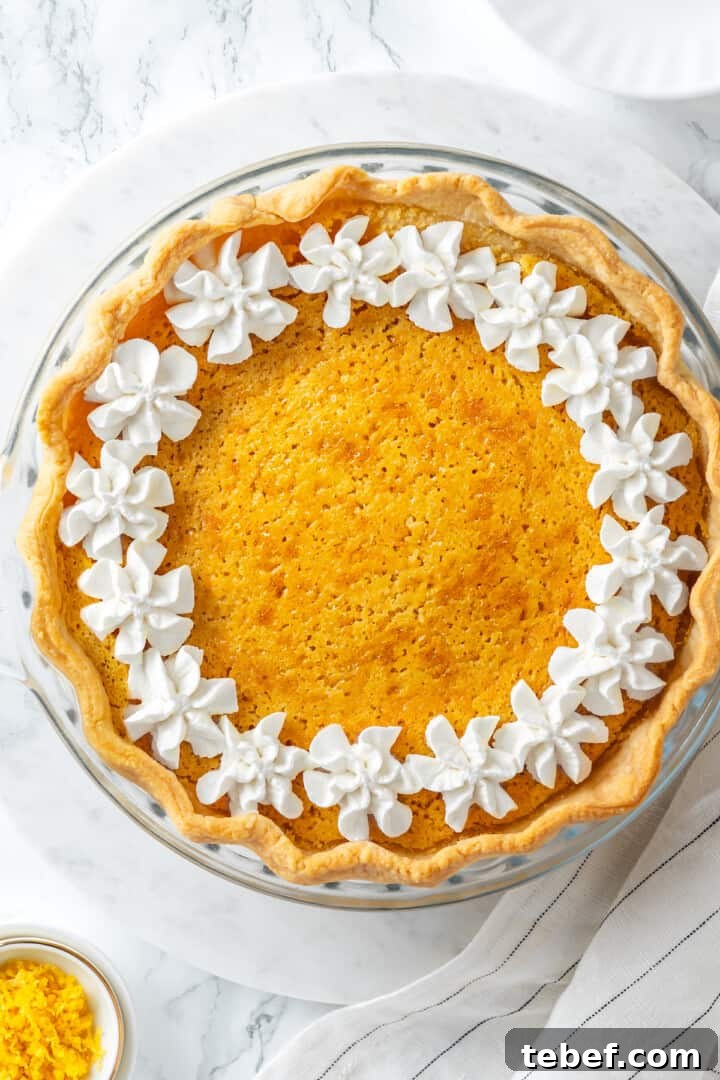 Overhead view of buttermilk pie in glass pie plate