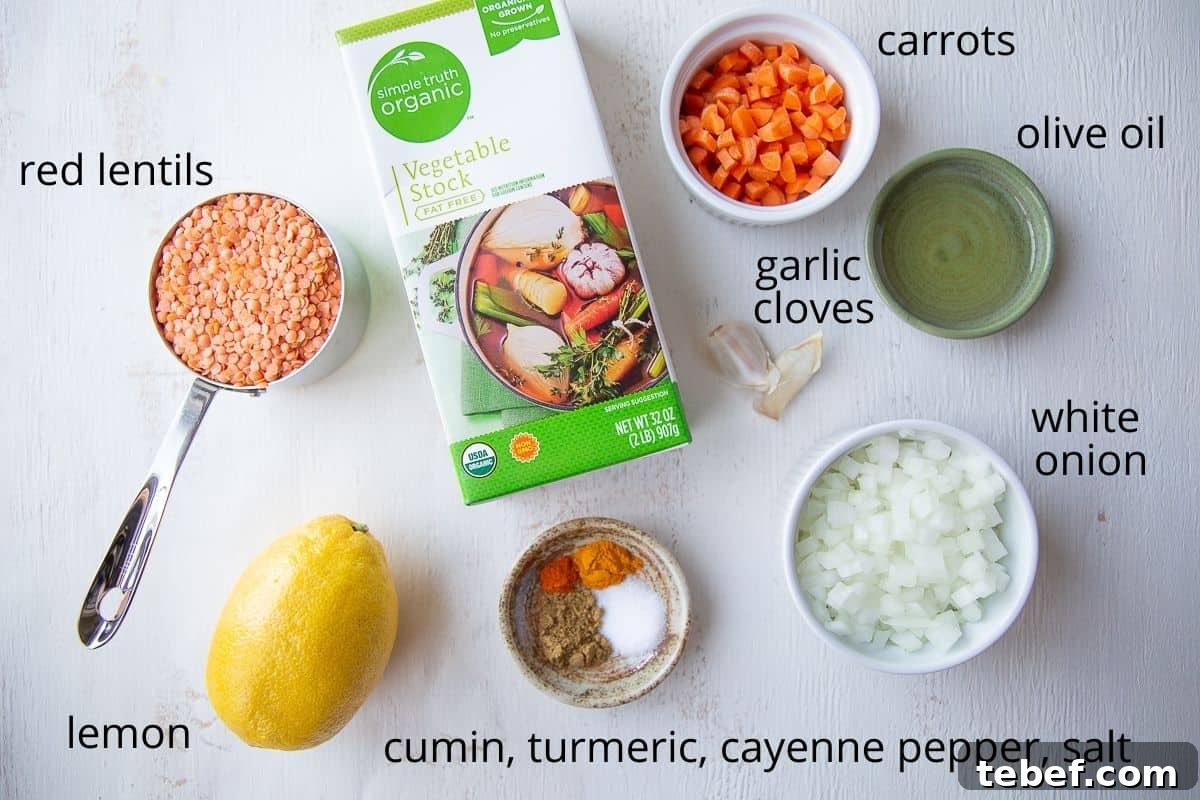 ingredients for lemon lentil soup on a white table